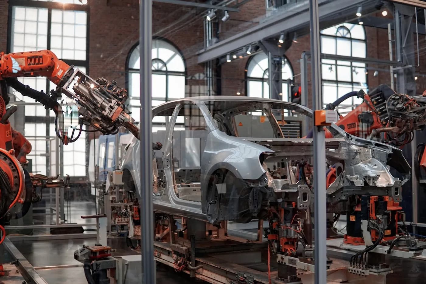 Robotic assembly line inside a modern manufacturing facility